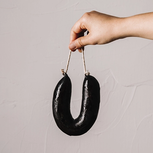 Morcilla de cebolla picante (1 uni.) - Delicies l'Avinguda-Terrassa - 2 Foto